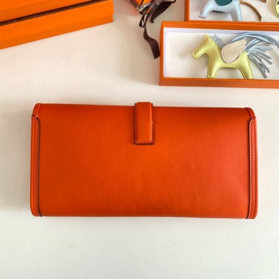 Hermes Jige Elan 29 Clutch Bag In Orange Swift Calfskin