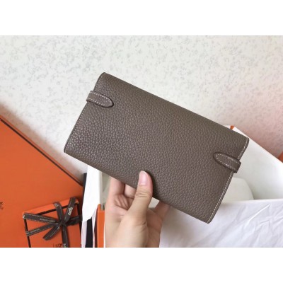 Hermes Kelly Classic Long Wallet In Etoupe Clemence Leather