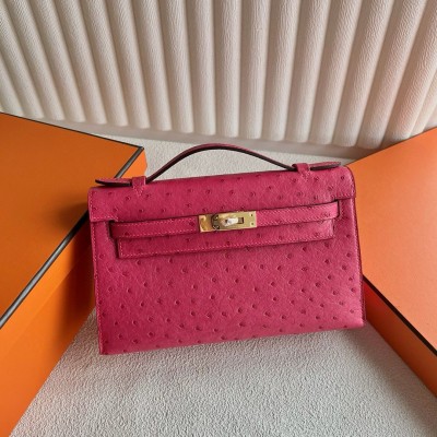 Hermes Kelly Pochette Handmade Bag in Rose Tyrien Ostrich Leather